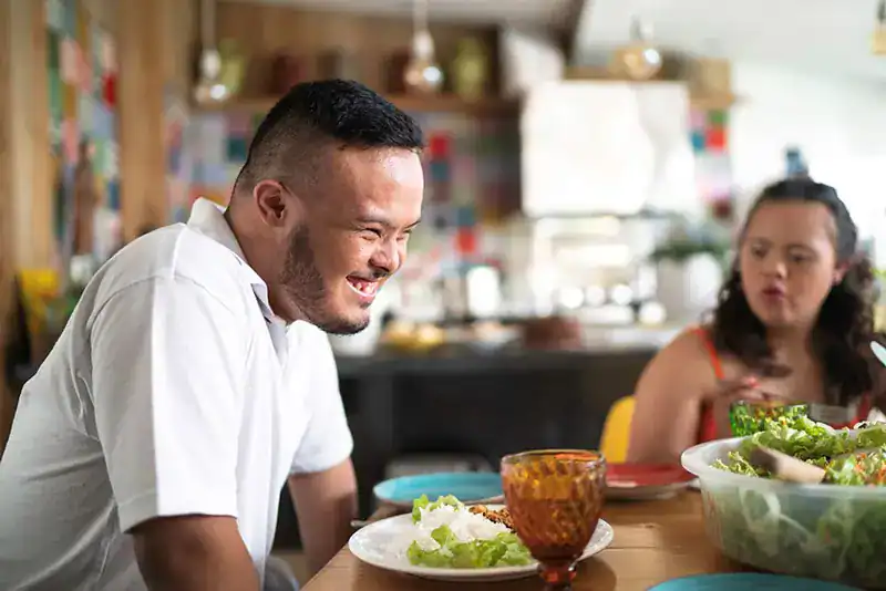 Empowering Weight Loss: A Comprehensive Guide for Individuals with Disabilities 2 Image of a disabled man and balance around nutrition to aid weight loss Walsall