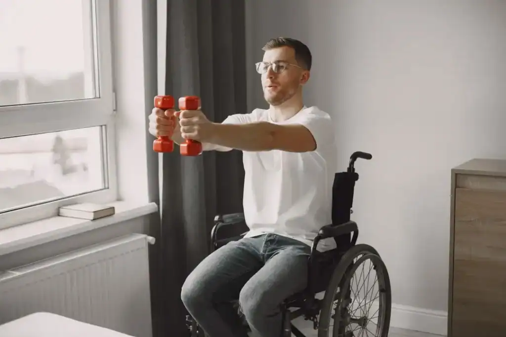 Empowering Weight Loss: A Comprehensive Guide for Individuals with Disabilities 1 Image of man doing exercise in his wheelchair to aid weight loss Walsall