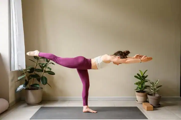 Achieving the Perfect Tone: How Often Should You Exercise for Results? 1 Woman doing Yoga exercise Walsall to help with toning the body.