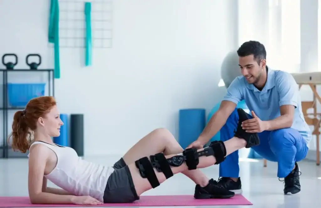 Debunking Meal Timing Myths: The Truth About Muscle Recovery 1 Woman having treatment to help muscle recovery Walsall after an injury